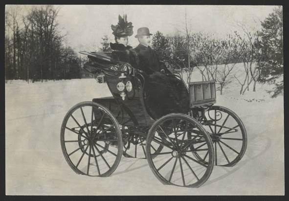 Walter and Fannie Baker in their 1897 Woods Electric with Shiloh National Military Park in the background